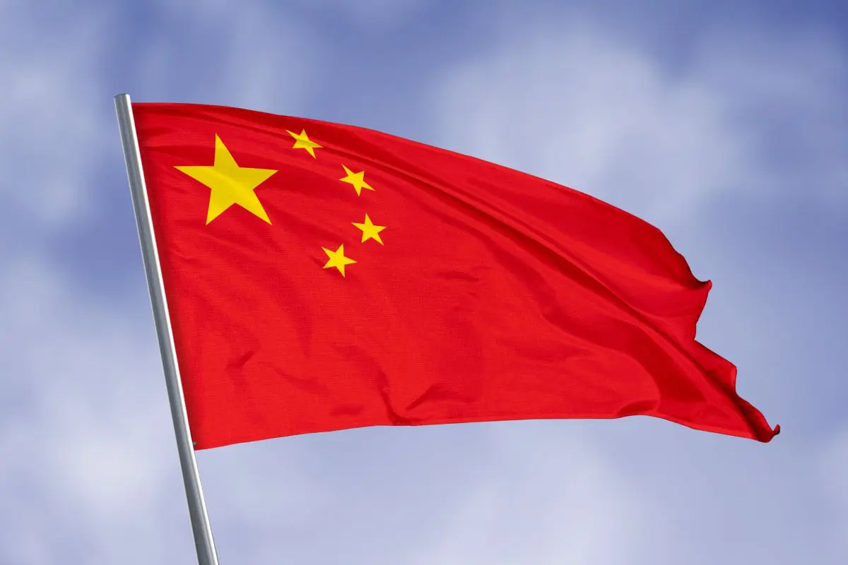 China,Flag,Isolated,On,Sky,Background.,Close,Up,Waving,Flag